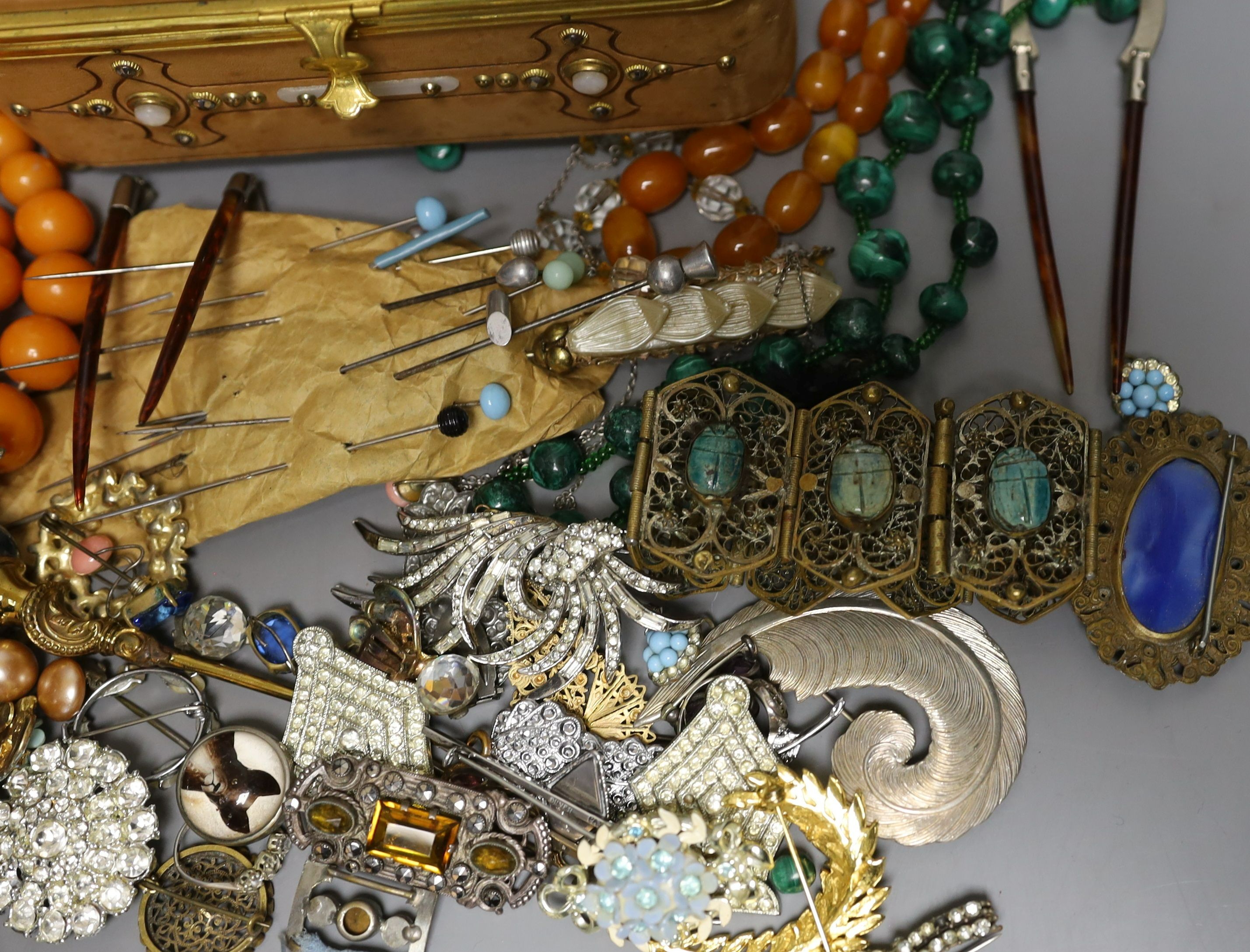 A 19th century calf skin and cut steel mounted trinket box and assorted costume jewellery, including a malachite necklace.